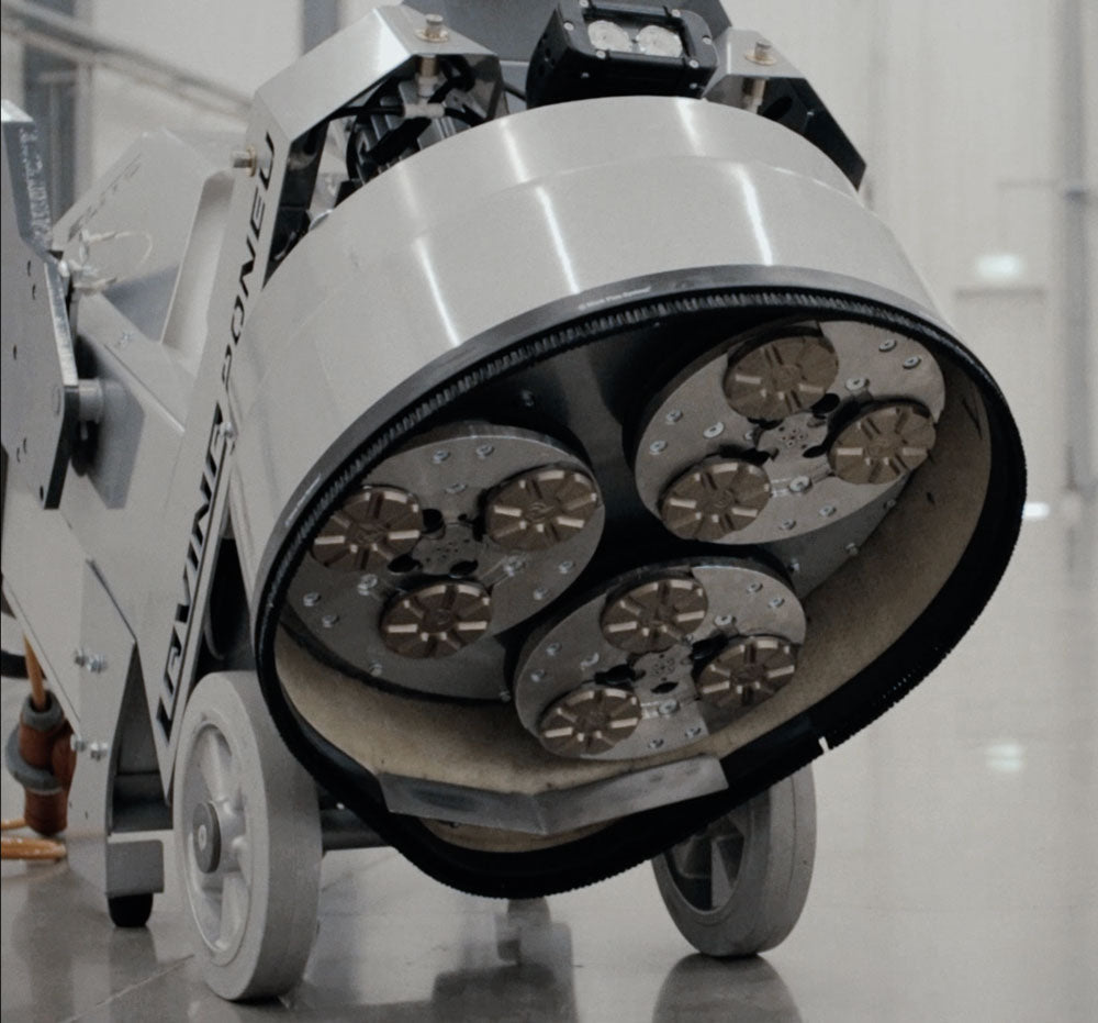 Lavina 20N Elite floor grinder, head tilted up showing metal bond diamond tooling