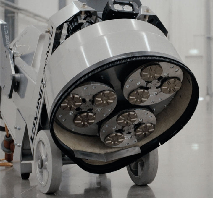 Lavina 20N Elite floor grinder, head tilted up showing metal bond diamond tooling